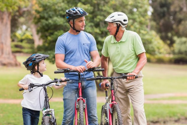 Happy multi generation family on their bike at the park on a sunny day "What 55 And Older Communities Near Colleyville, TX Can Do To Drive Family Engagement "