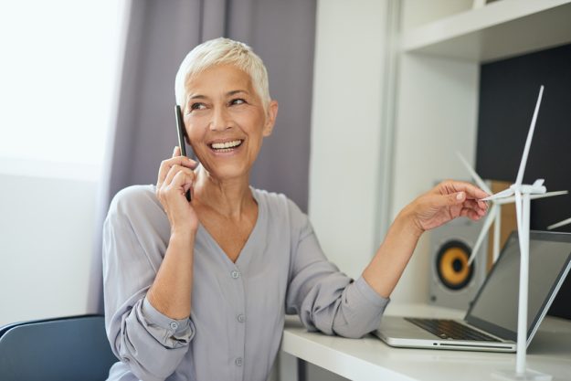 Gorgeous Caucasian senior woman talking on the phone and touchin 5 Tips For Expanding Your Social Circle While Living In A Senior Retirement Home In Lewisville, TX