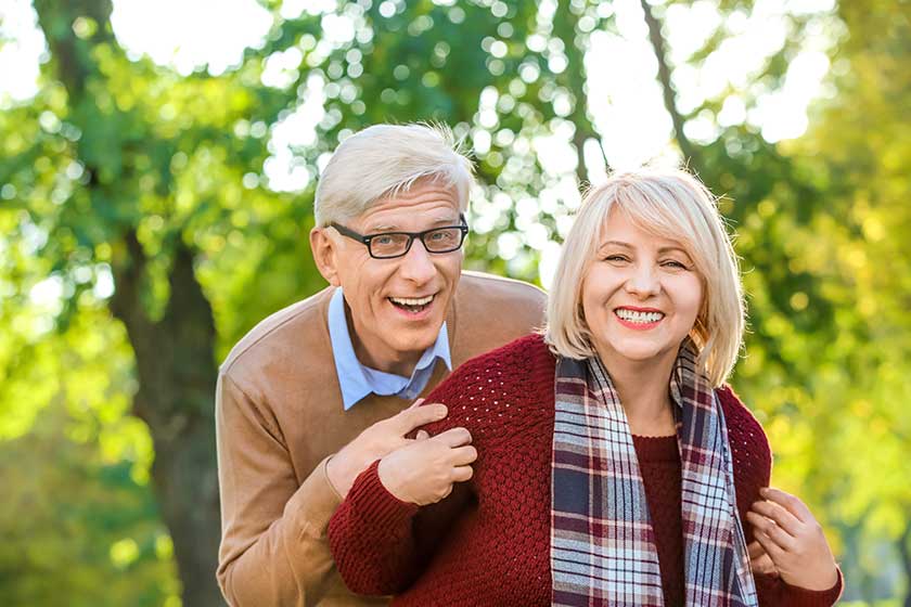 Cute elderly couple in autumn park Cute elderly couple in autumn park
