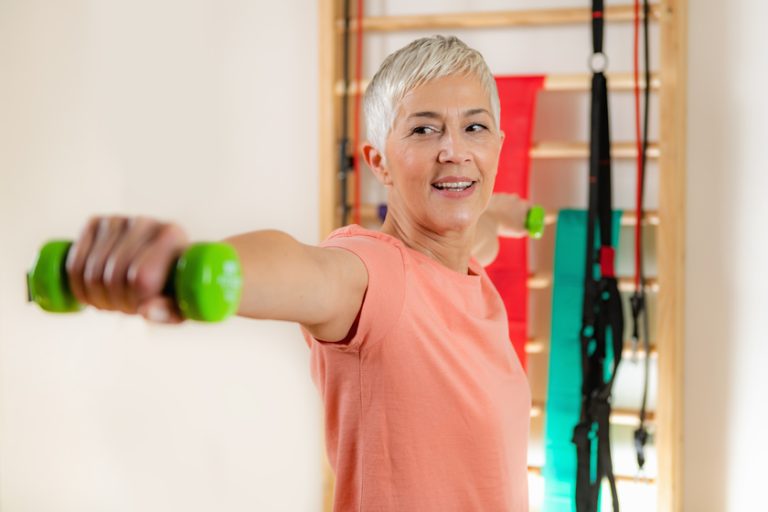 Portrait of Senior Woman Exercising Exploring Senior Health Blogs To Learn More About Getting Healthier