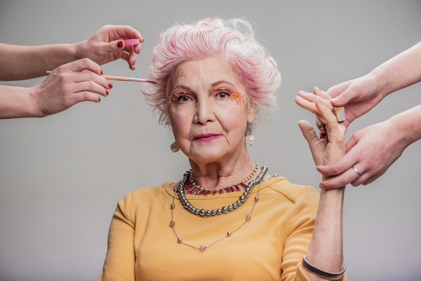 Stylish adult female sitting in studio 8 Reasons Why Coloring Hair Makes elders Feel Young