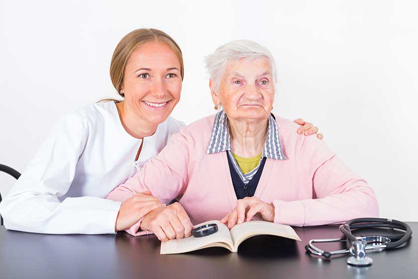 Elderly woman and young doctor Elderly woman and young doctor