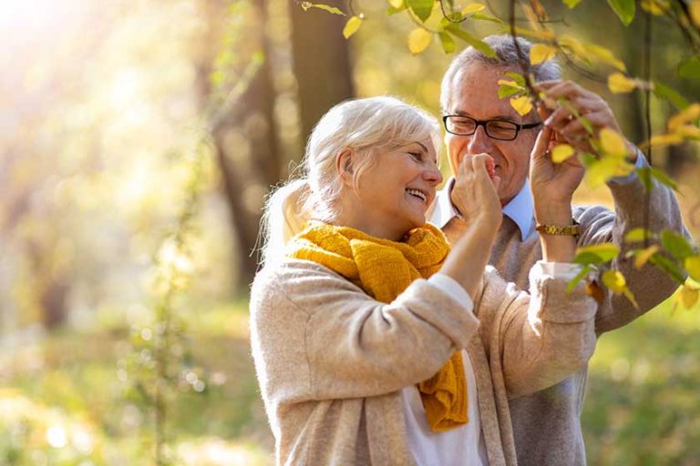 Happy senior couple in autumn park Happy senior couple in autumn park