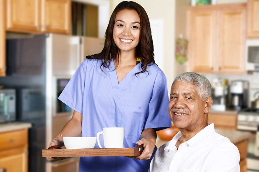 Health Care Worker and Elderly Man