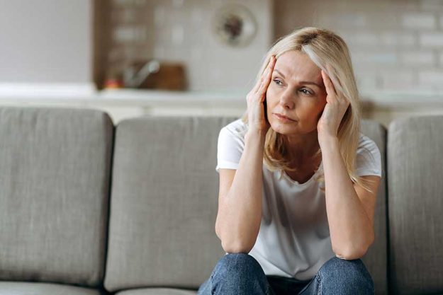 Sad caucasian senior woman