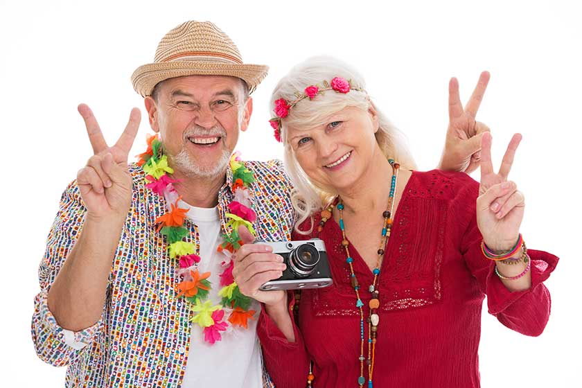 Senior couple dressed like a hippie