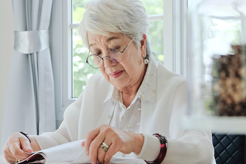 Senior woman reading a book Senior woman reading a book