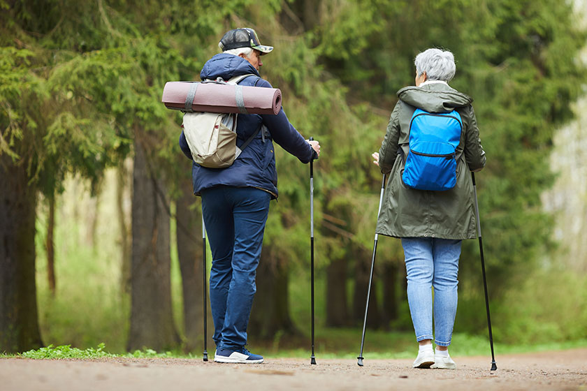 Back view portrait of active senior couple