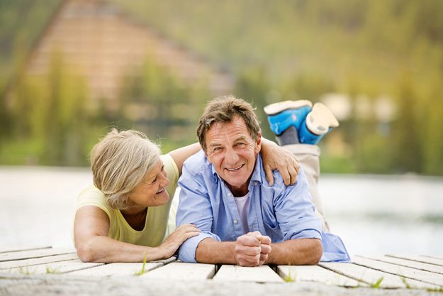 Senior couple having fun on pier Senior couple having fun on pier