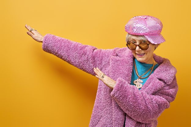 Senior woman on color background