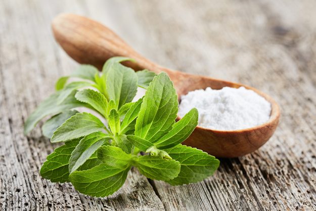 Stevia plant with powder Stevia plant with powder