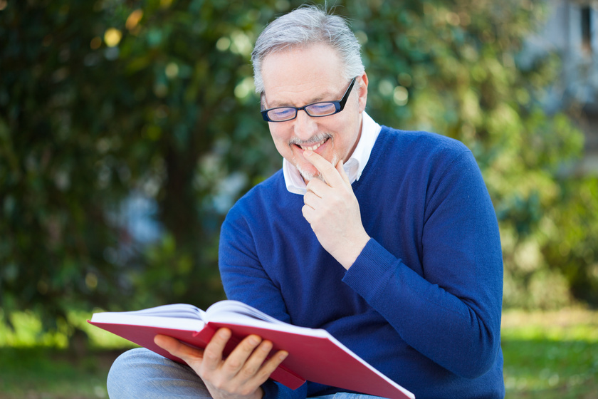 Man reading a book Man reading a book