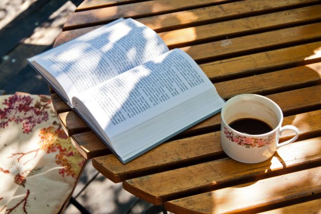 Book and coffee on wood table Book and coffee on wood table
