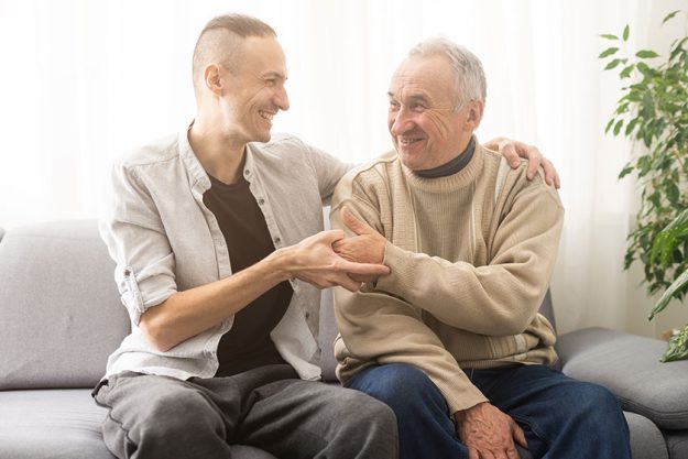 Happy two generations male family