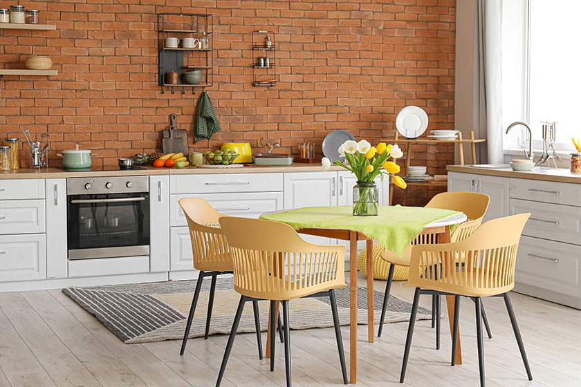Interior of stylish kitchen with dining table