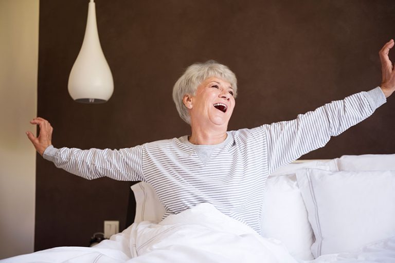 Mature woman yawning