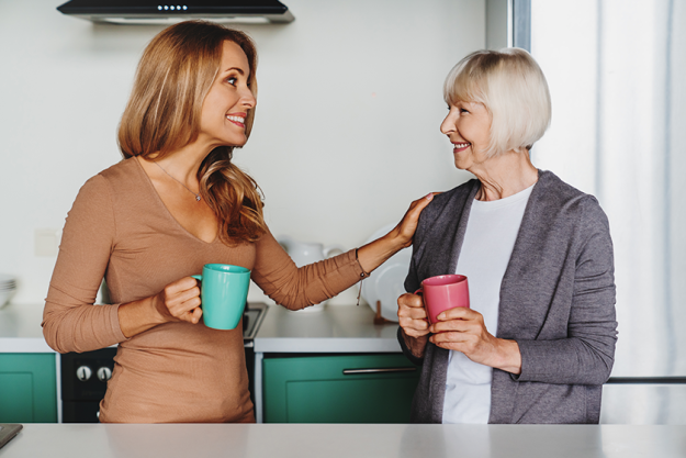 Senior woman enjoying in meeeting with her daughter