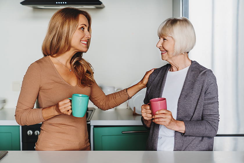 Senior woman enjoying in meeeting with her daughter