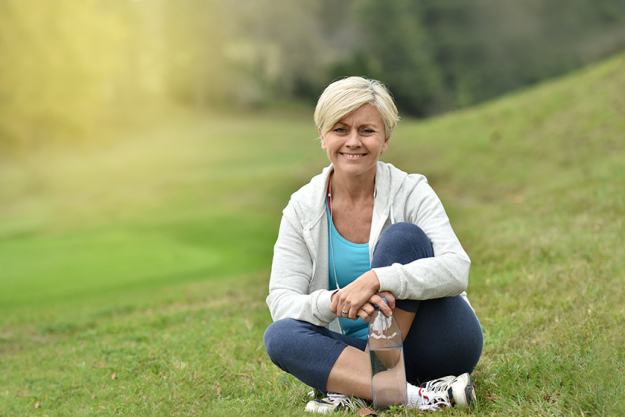 Senior woman relaxing outside Senior woman relaxing outside