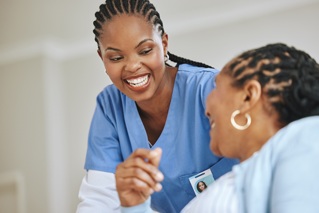 Shot of a nurse speaking to her female patient Shot of a nurse speaking to her female patient