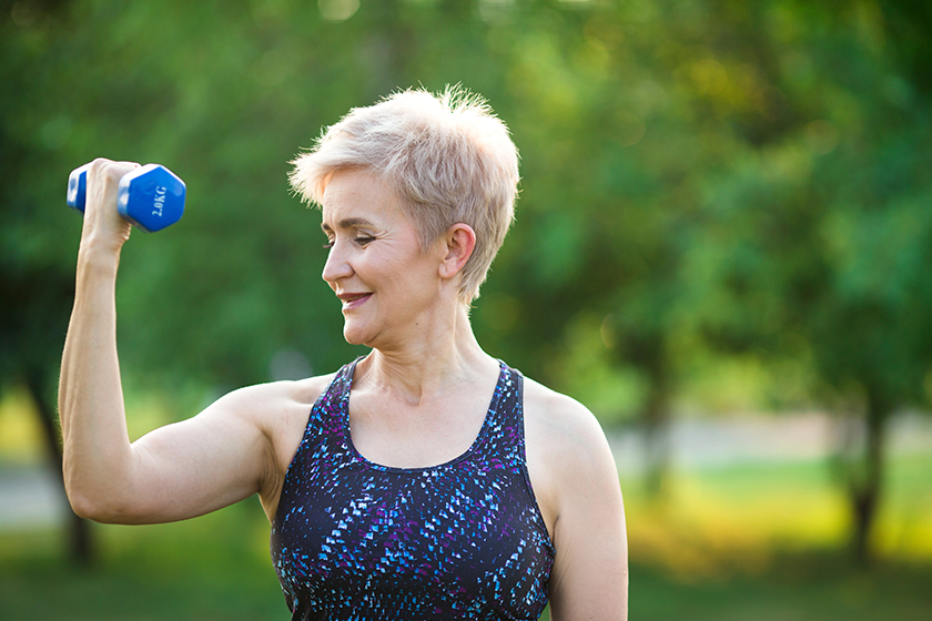 Stylish elderly woman with short hairstyle doing sports Stylish elderly woman with short hairstyle doing sports