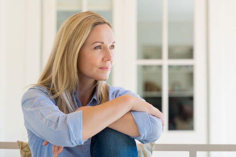 Thoughtful mature woman