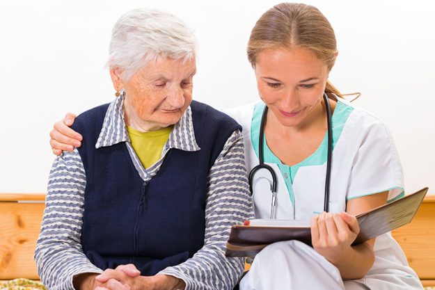 Elderly woman and young doctor