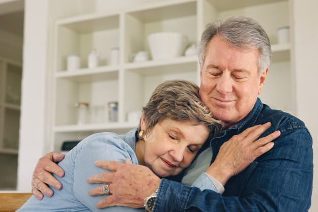mature couple hug