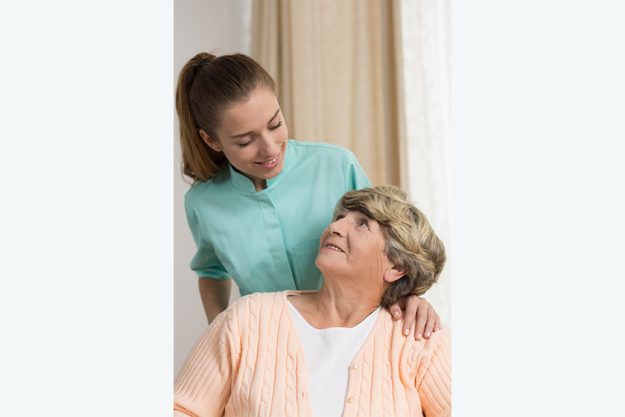 professional carer nursing senior lady
