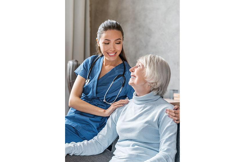 vertical portrait happy elderly woman nurse home vertical portrait happy elderly woman nurse home
