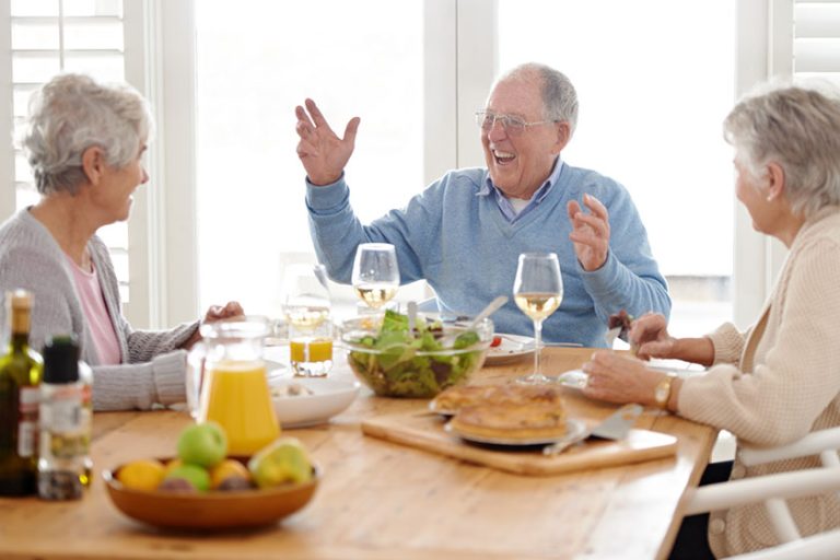 Life starts at retirement a senior man and two senior women enjoying lunch Life starts at retirement a senior man and two senior women enjoying lunch