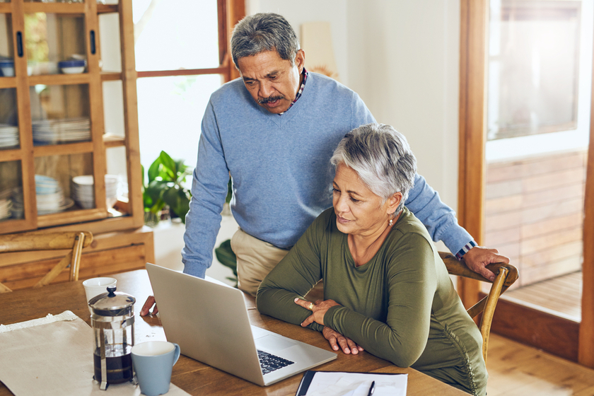 Keeping their spending and saving habits in check. a mature couple managing their paperwork together at home.