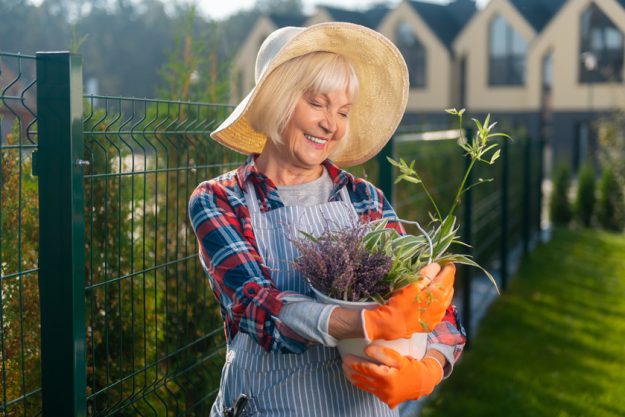 Nice retired involved woman enjoying a warm day Nice retired involved woman enjoying a warm day