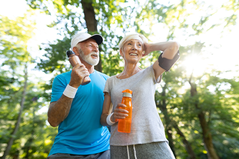 Senior couple drinks water replenish energy hydrate Senior couple drinks water replenish energy hydrate