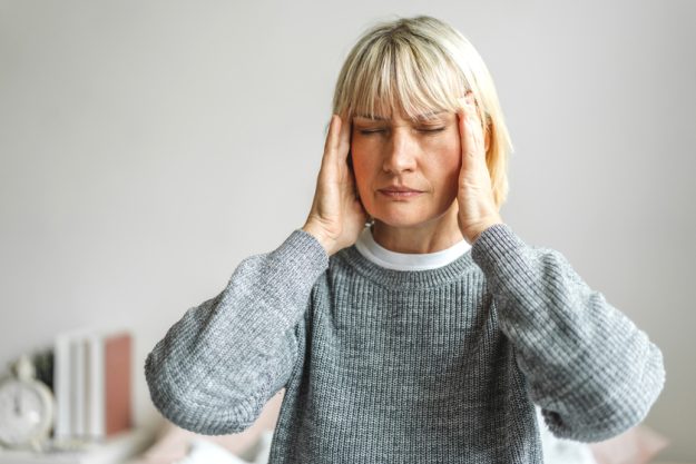 Senior adult elderly women serious depressed and feeling headach Senior adult elderly women serious depressed and feeling headach