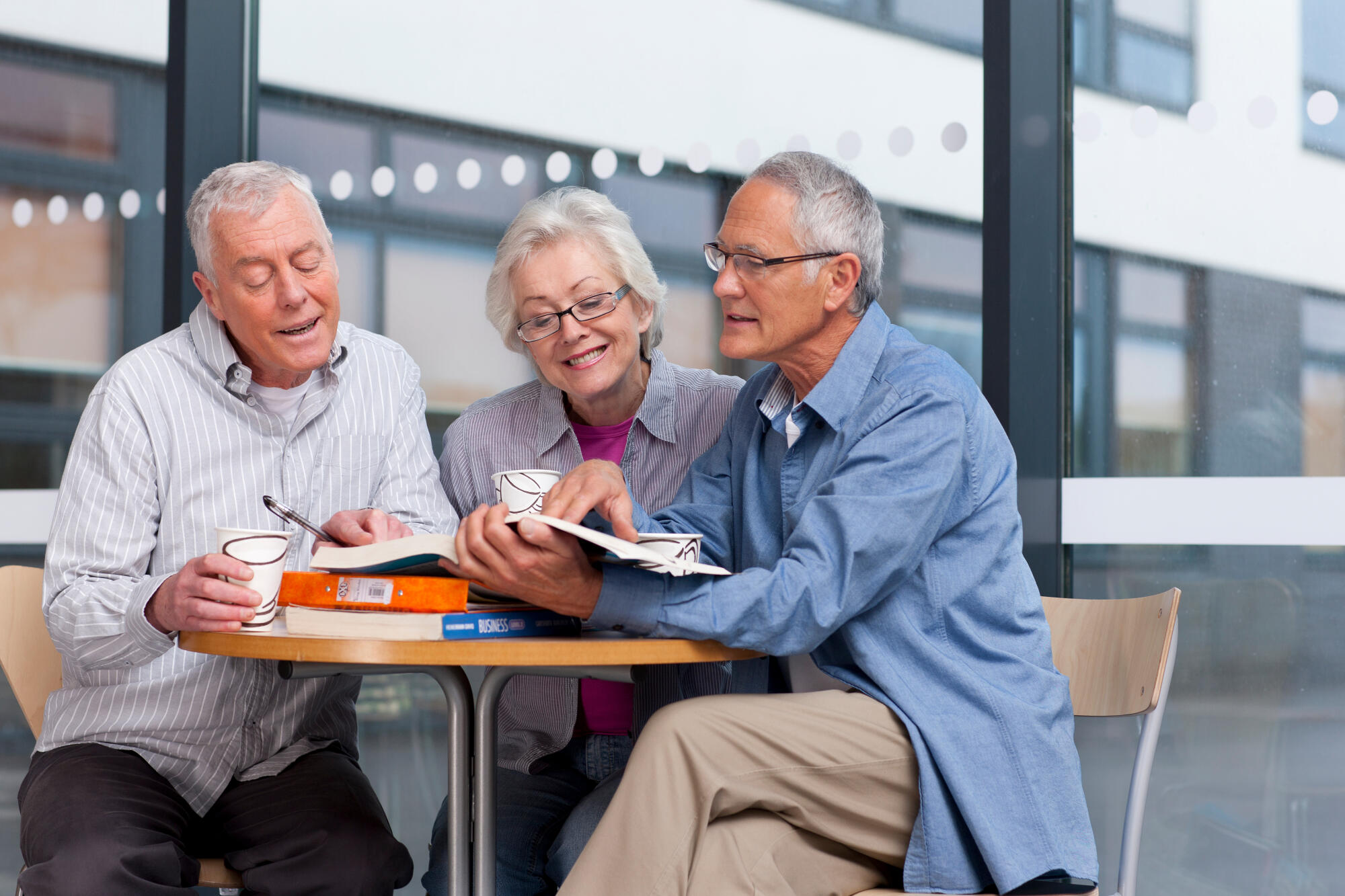 A,Medium,Shot,Of,Three,Happy,Senior,Students,Looking,At A,Medium,Shot,Of,Three,Happy,Senior,Students,Looking,At