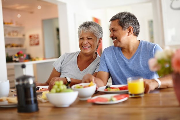 Enjoying a leisurely lunch. a happy senior couple enjoying a leisurely breakfast together at home.