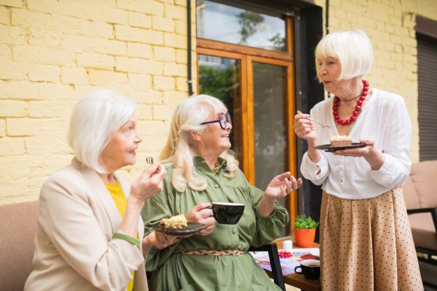Old friends feeling great while spending time together and drinking tea