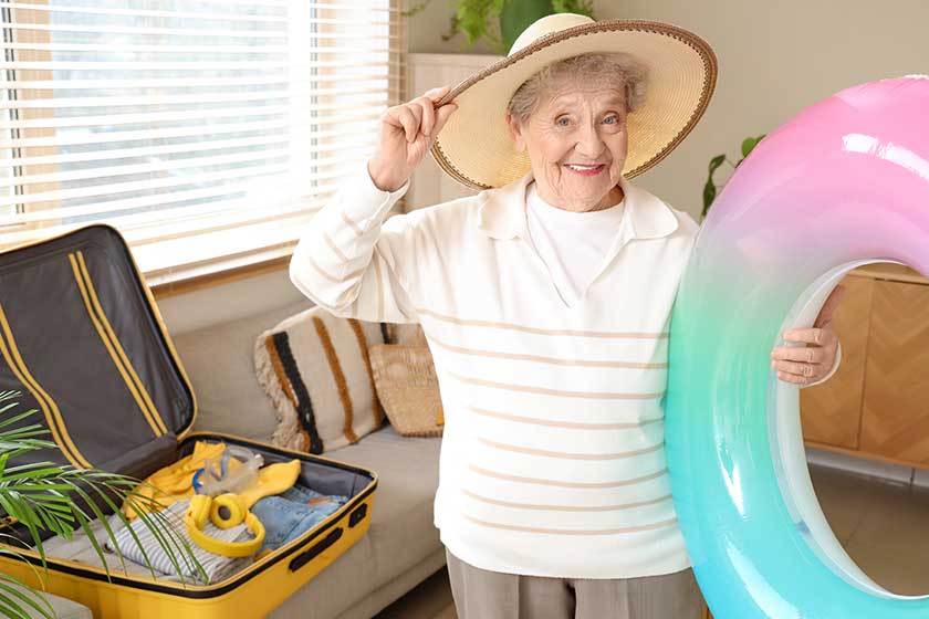 Senior female tourist swim ring home