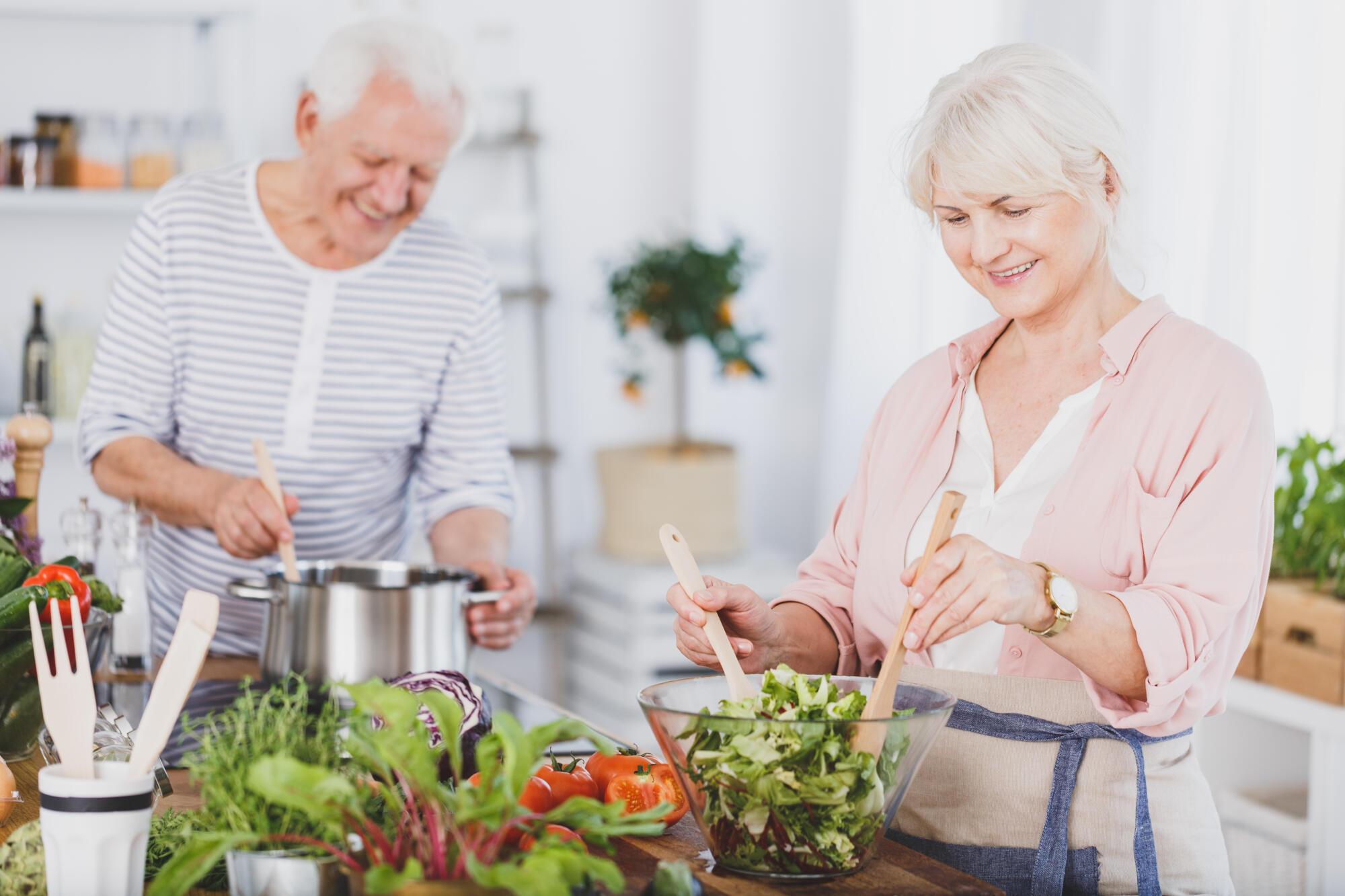 Senior,Man,And,Woman,Preparing,Food,In,The,Kitchen