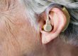 person wearing beige hearing a