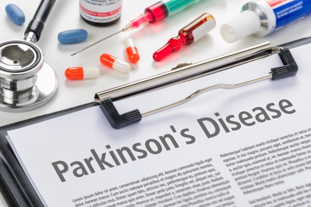 The diagnosis Parkinsons Disease written on a clipboard