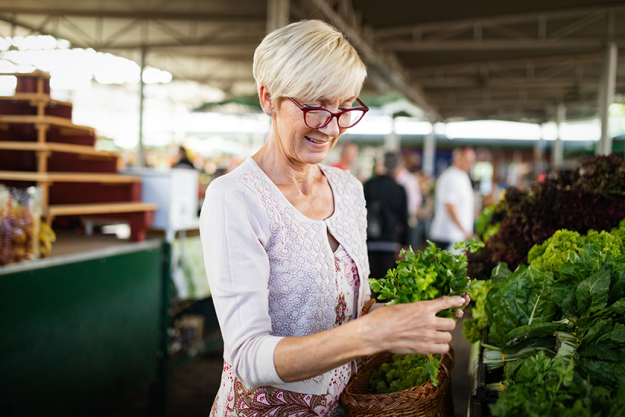 Senior woman buying vegetables fruits green market Senior woman buying vegetables fruits green market