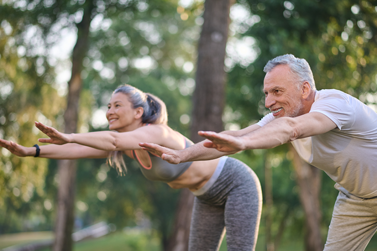 a mid aged couple having a workout