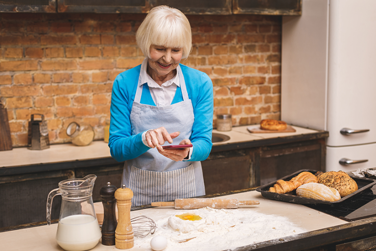 attractive senior aged woman cooking attractive senior aged woman cooking