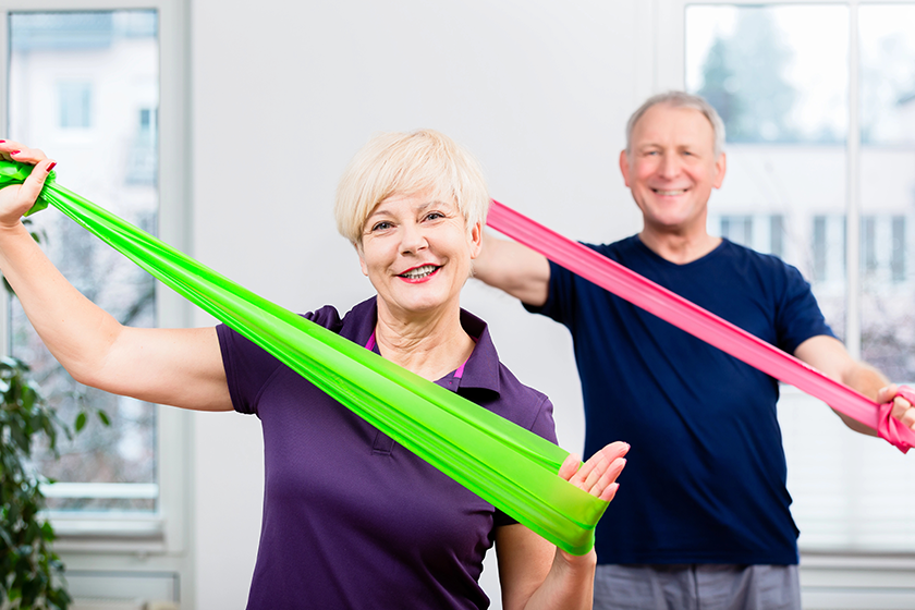 elderly couple in senior gymnastic class elderly couple in senior gymnastic class