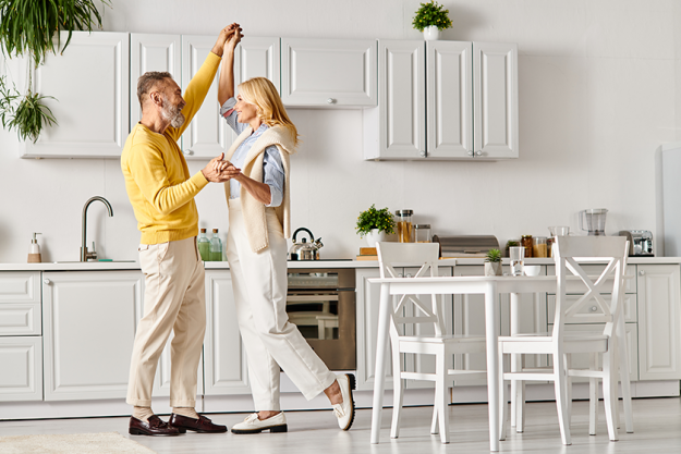 mature loving couple cozy homewear dancing mature loving couple cozy homewear dancing