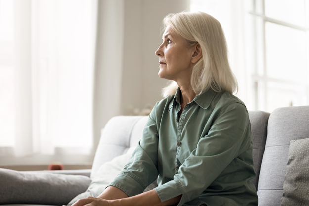 pensive silent sad senior female sitting pensive silent sad senior female sitting