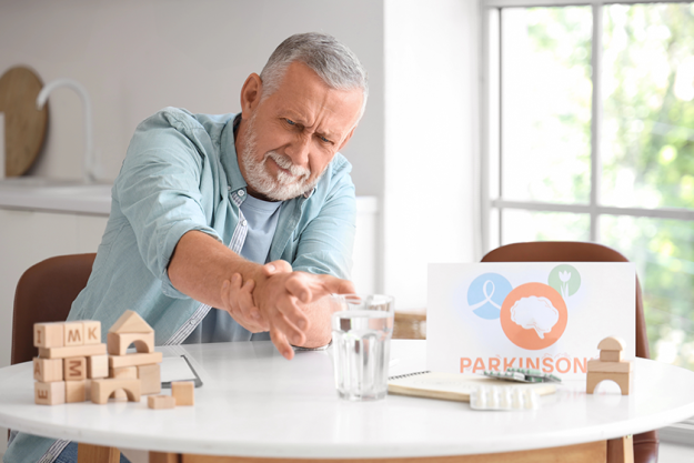 senior man suffering parkinson syndrome senior man suffering parkinson syndrome