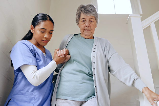 senior woman nurse help stairs senior woman nurse help stairs